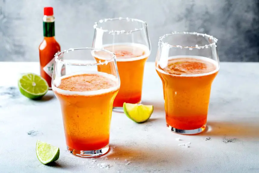 Mexican drinks - Beer served as Michelada with salt and chili